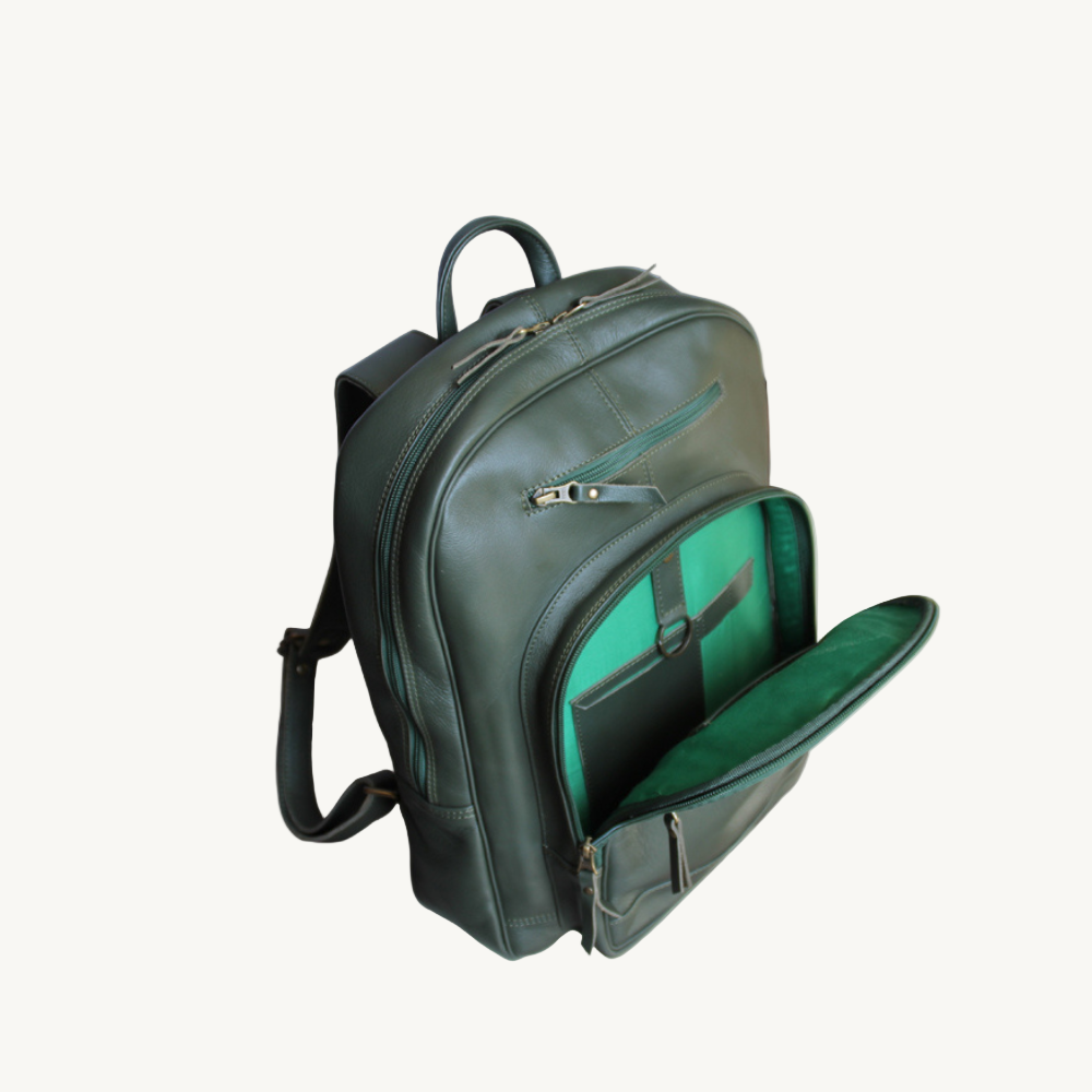 Green backpack with open front compartment on a white background