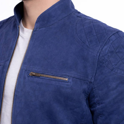 Men’s premium blue suede leather moto jacket featuring a stand-up collar, zippered chest pockets, and adjustable zipper cuffs.