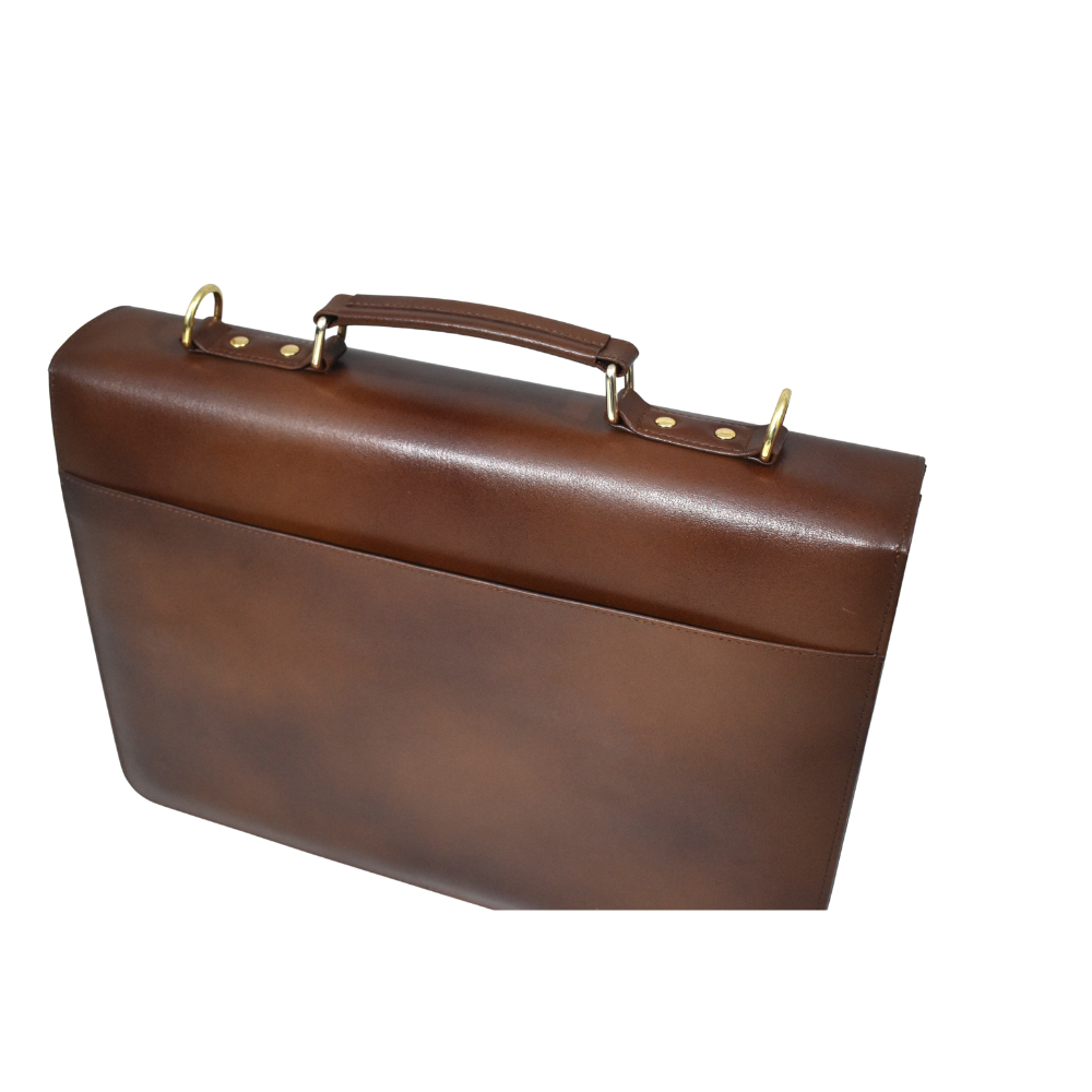 Brown cowhide leather briefcase with a top handle, adjustable shoulder strap, and gold-tone lock closure on the front flap