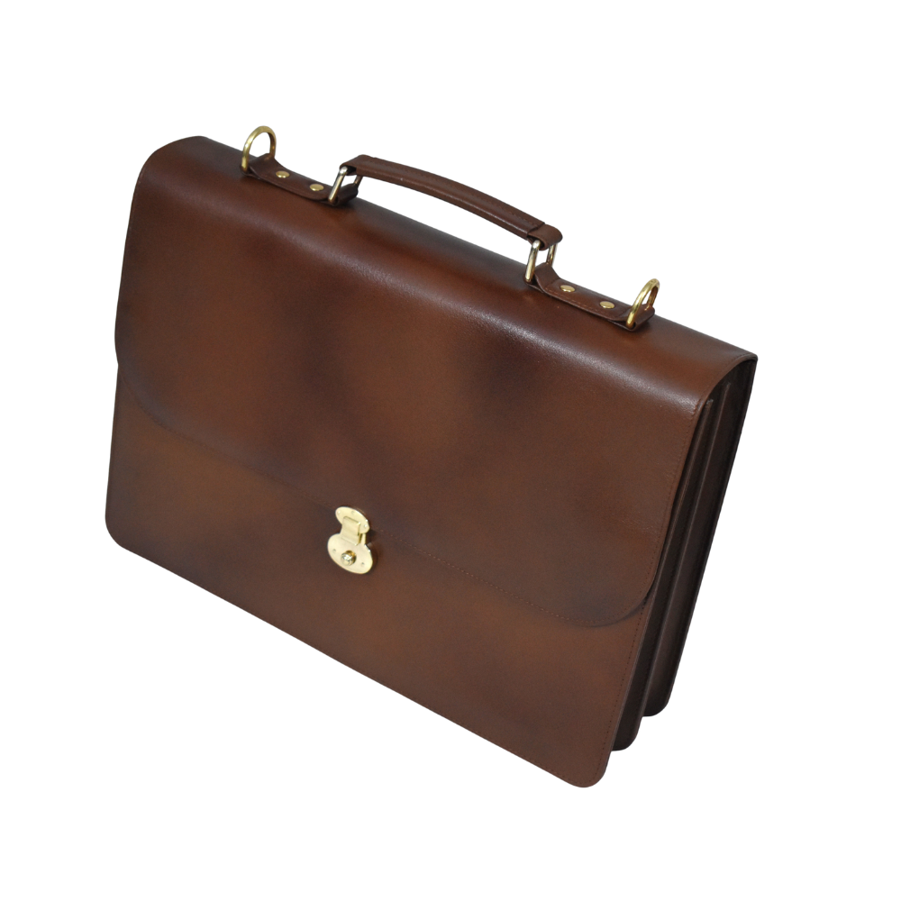 Brown cowhide leather briefcase with a top handle, adjustable shoulder strap, and gold-tone lock closure on the front flap